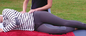 Ella gay treating a horse rider